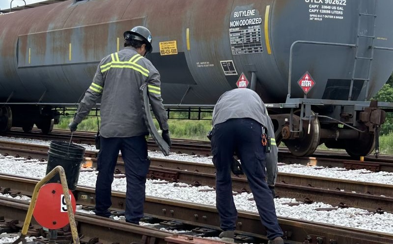 Gravity Rail employees performing track maintenance